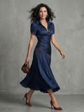 Madeleine - Striped Pleated Midi Dress