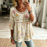 Daphne - Floral Embroidered Peplum Blouse