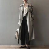 Madeleine - Double-Breasted Belted Longline Trench Coat